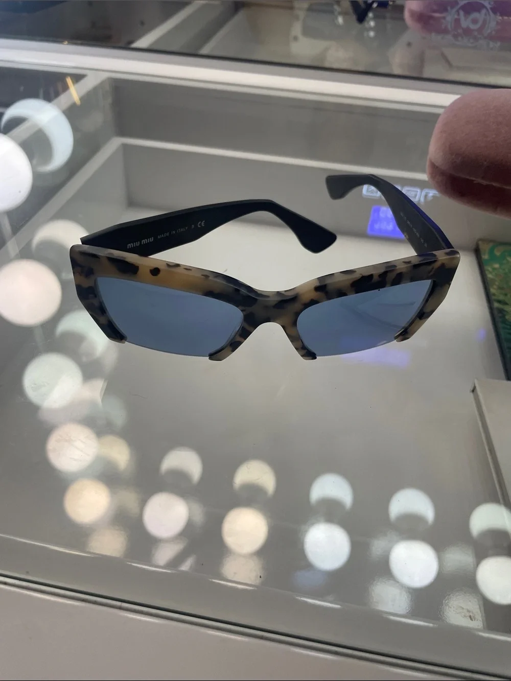 Miu Miu Tortoiseshell Cat-Eye Sunglasses with Dark Blue Lenses